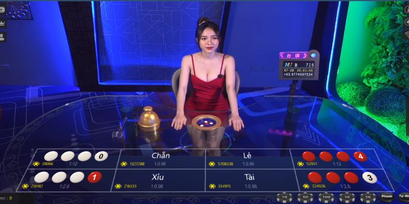 Trải nghiệm cá độ quay đĩa cùng dealer xinh đẹp tại Kubet77